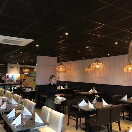 فندق Tasty World